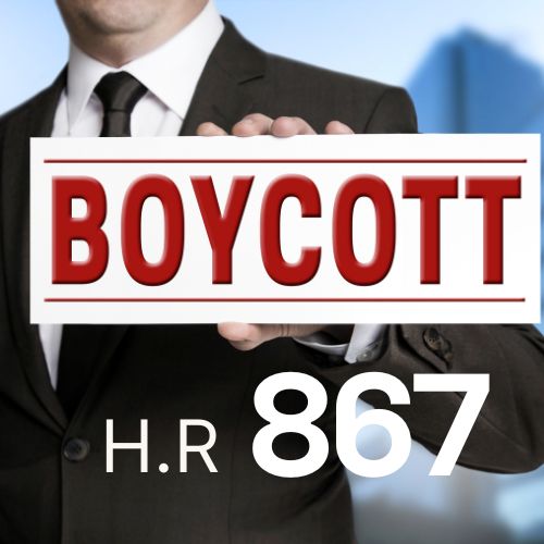 A man in a suit with a sign taht says boycott and under it says H.R 867
